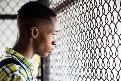 Ashton Sanders as high school-age Chiron in “Moonlight,” which follows Chiron as a young man growing up in Miami and grappling with his sexuality. Photo: David Bornfriend/A24.
